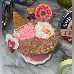 Whimsical Dessert-Themed Decor 
Cupcake fake bake